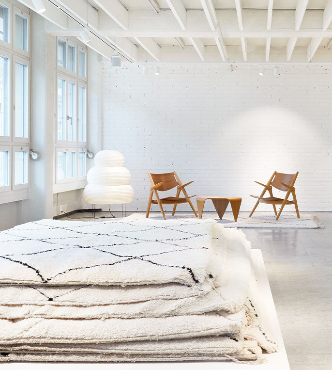 MAANA STUDIOS - A Swiss rug & interior company.
